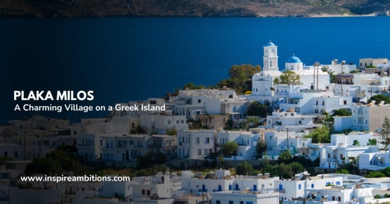 a white buildings with blue domes on a hill