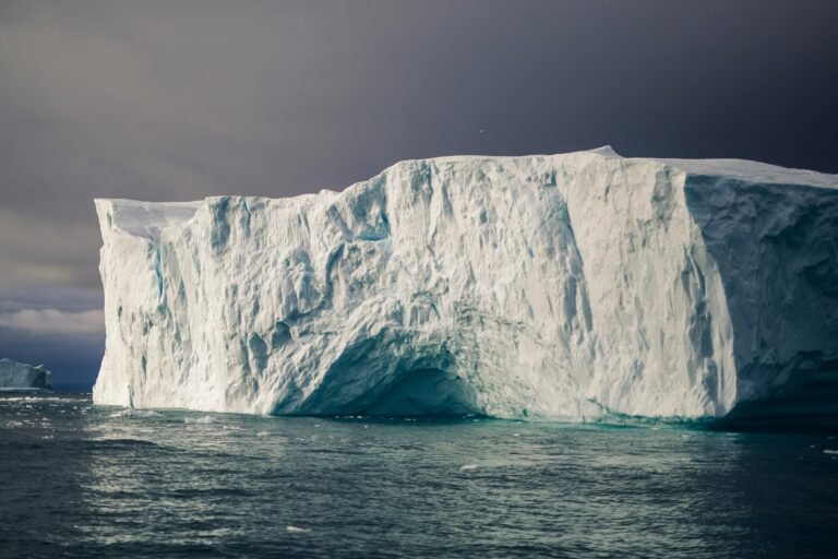 a large iceberg in the ocean